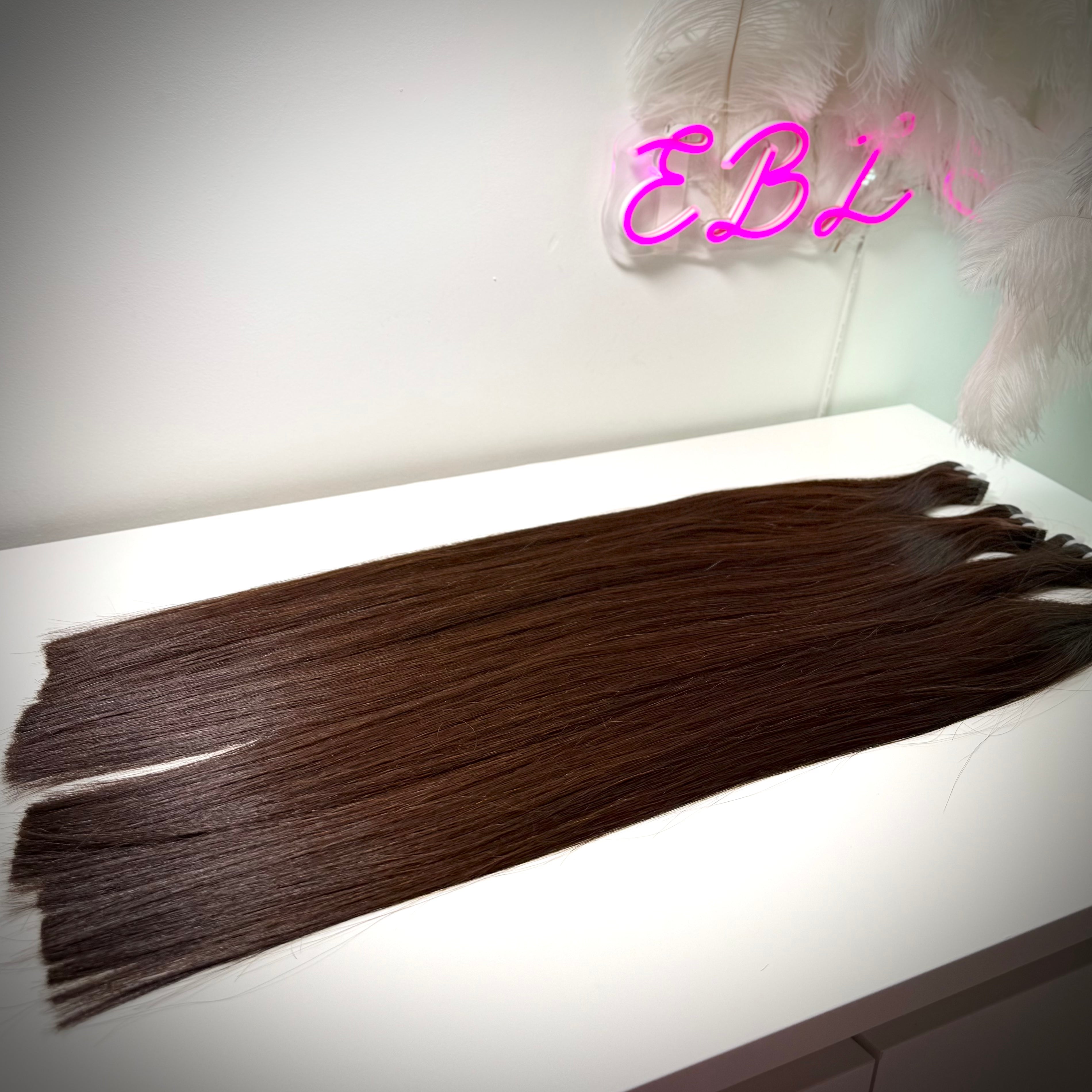 Raw Vietnamese tape-in hair extensions for sleek, natural looks in the UK and Ireland.
