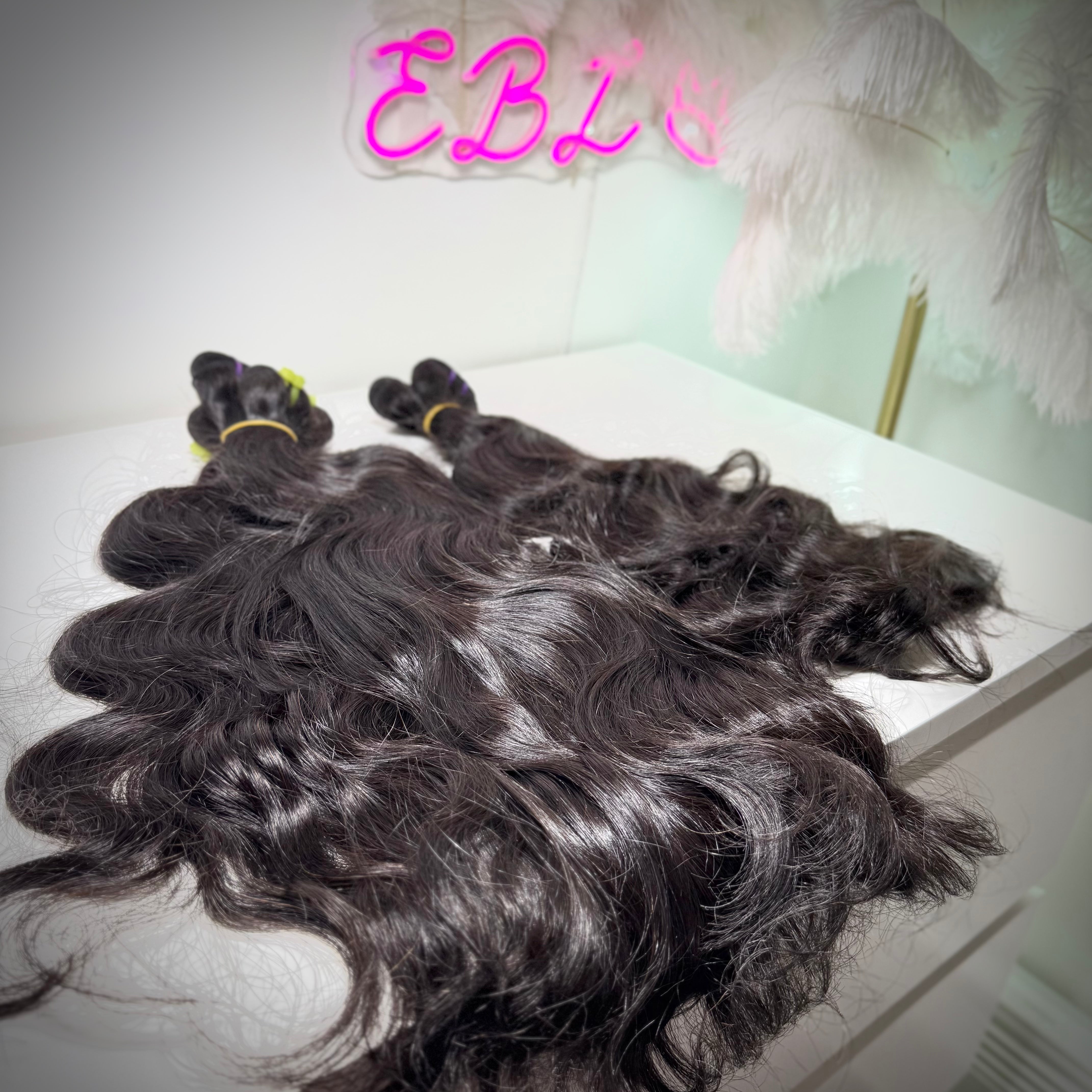Raw Vietnamese wavy bundle with 100% human hair for natural installs in the UK and Ireland.