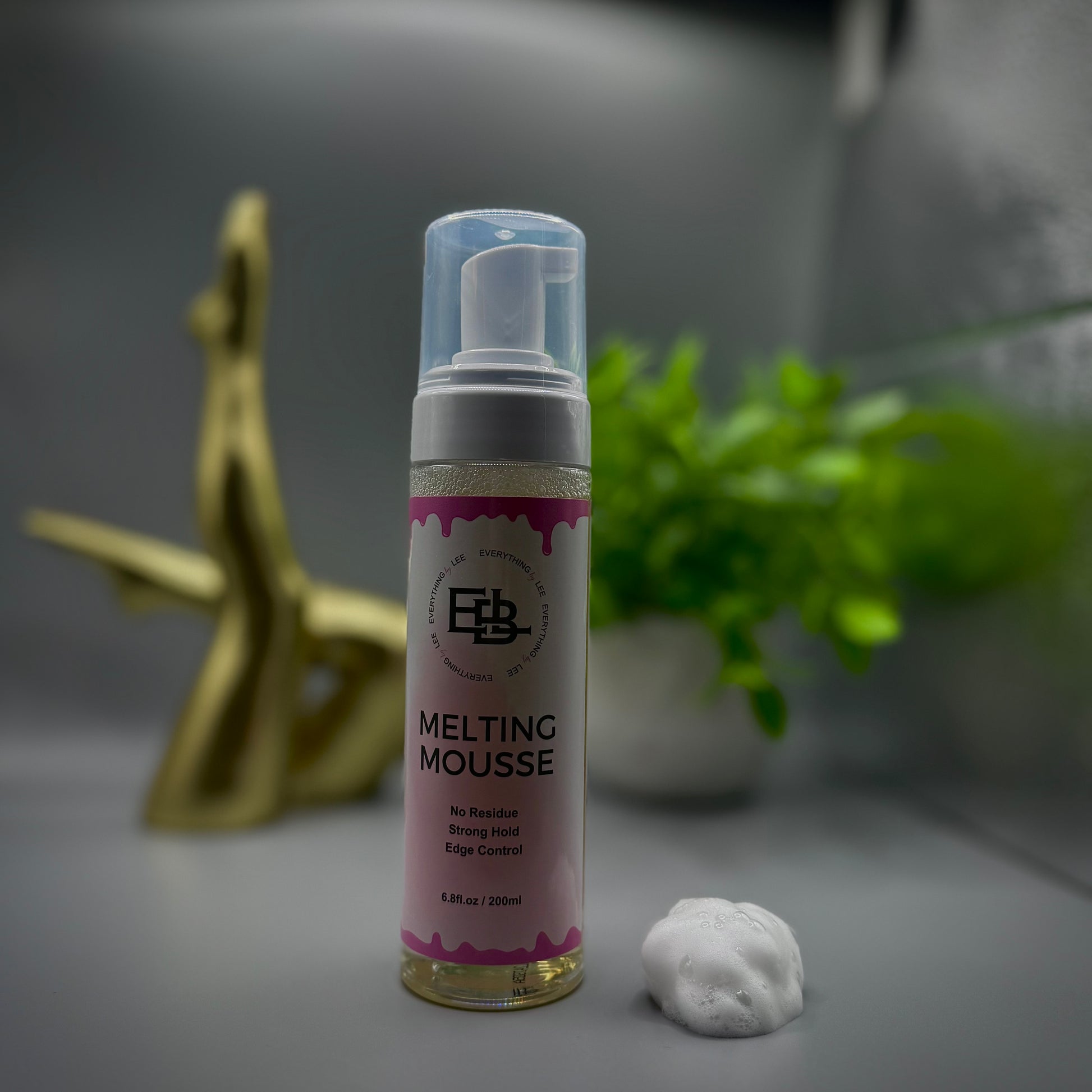 Bottle of lace melting mousse by EBL Hair for glueless wig installs and edge control