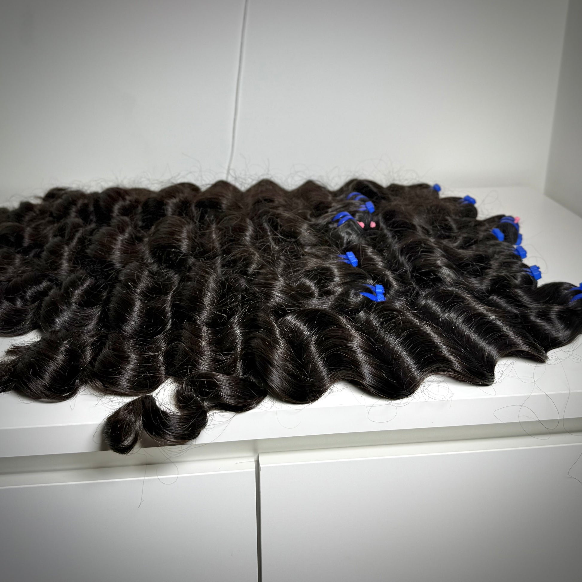 100% raw loose wavy human hair bundle with soft flowing waves – thick, natural texture ideal for sew-ins, custom wigs, and natural-looking installs