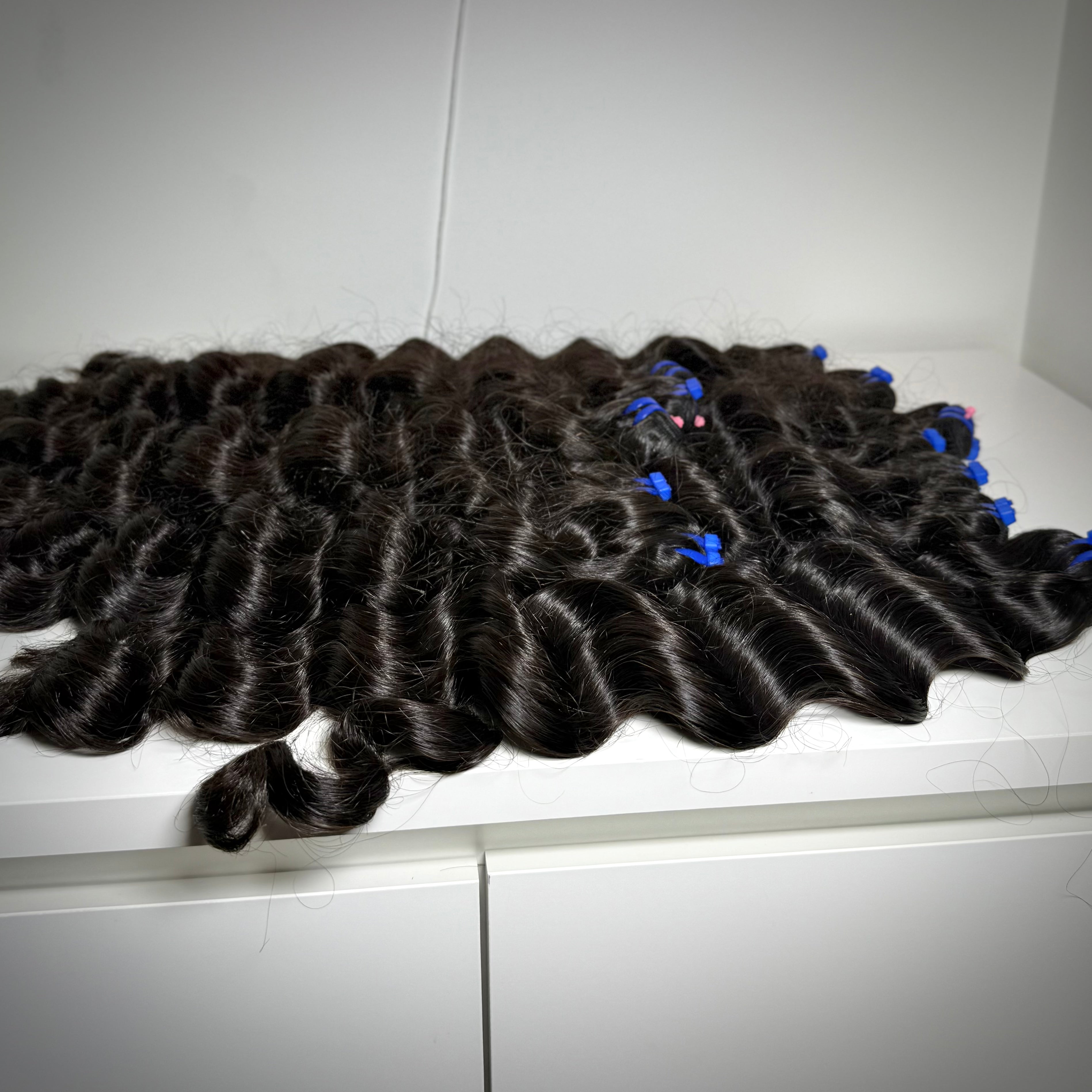 100% raw loose wavy human hair bundle with soft flowing waves – thick, natural texture ideal for sew-ins, custom wigs, and natural-looking installs