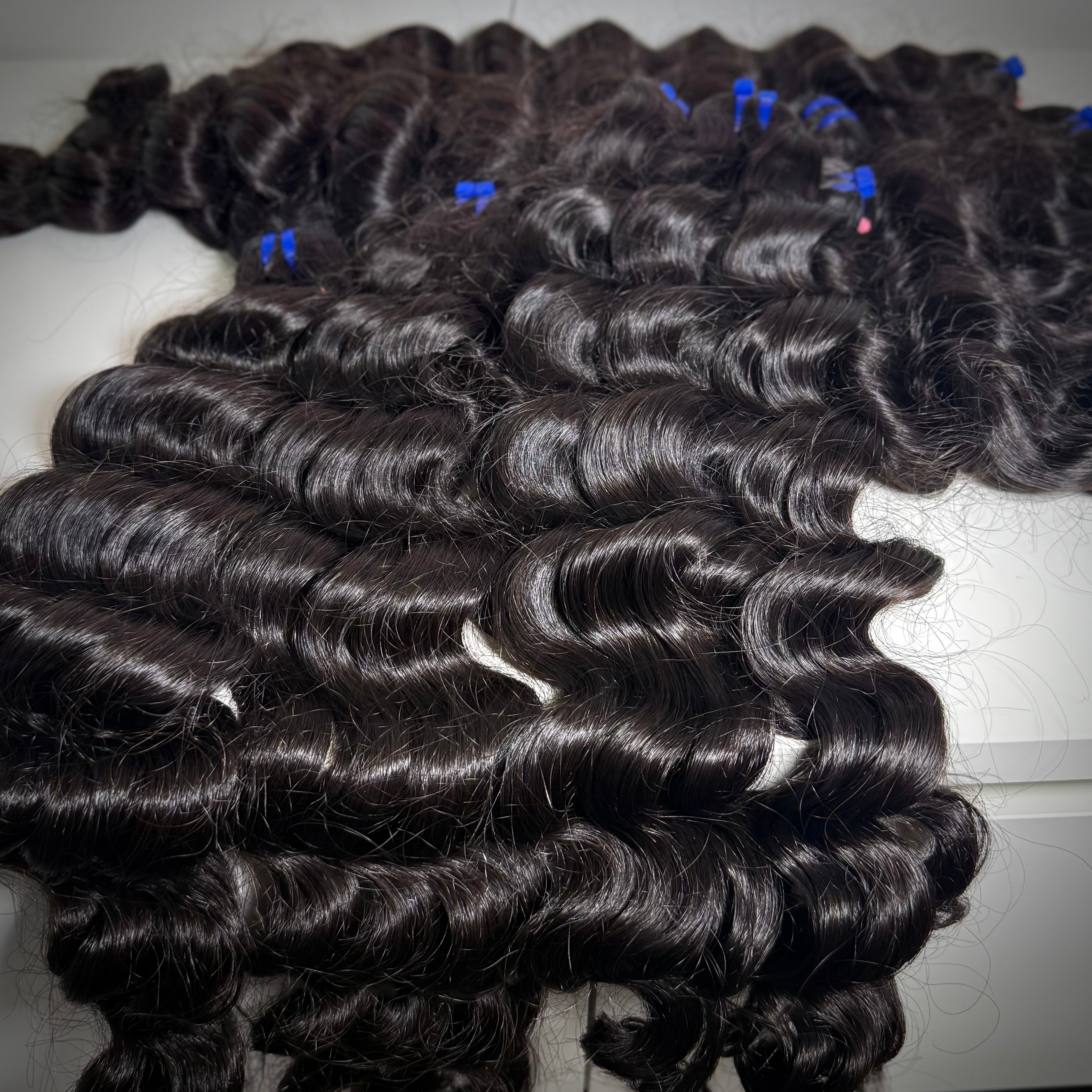 100% raw loose wavy human hair bundle with soft flowing waves – thick, natural texture ideal for sew-ins, custom wigs, and natural-looking installs